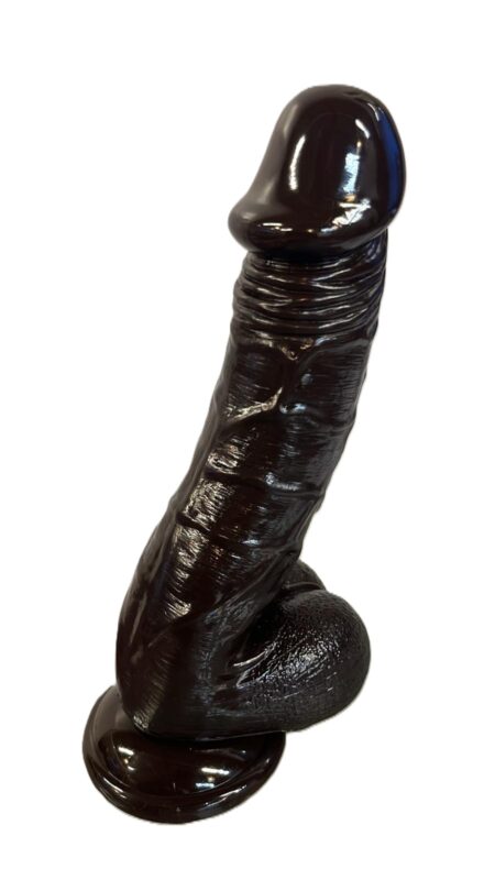 “Dark brown shiny curved dildo 9.5 inch with suction base and circumcised head front view”