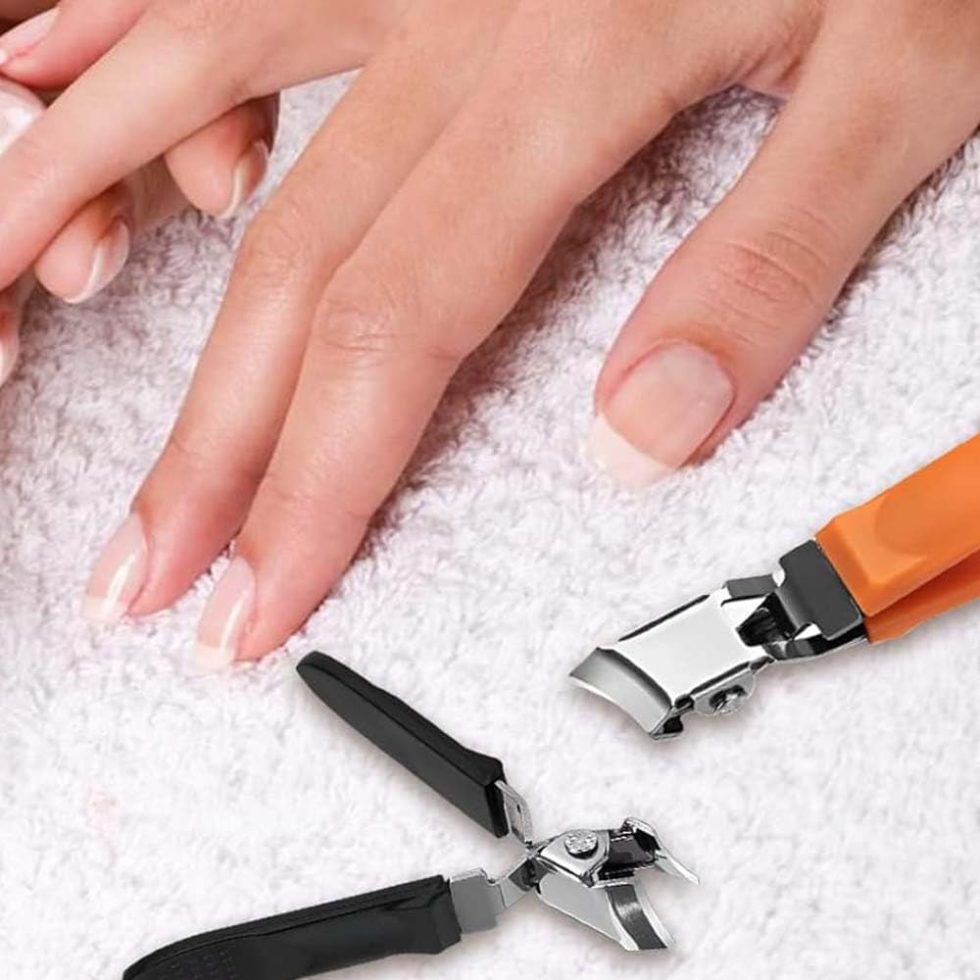 Long-handle curved nail clipper for safer intimacy