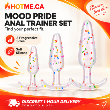 Mood Pride silicone anal trainer set displayed on a marble surface beside folded white towels in a bright bathroom setting.